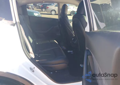 2021 Tesla Model Y Long Range Dual Motor All-Wheel Drive z USA, uszkodzony, nr VIN 5YJYGAEEXMF186341